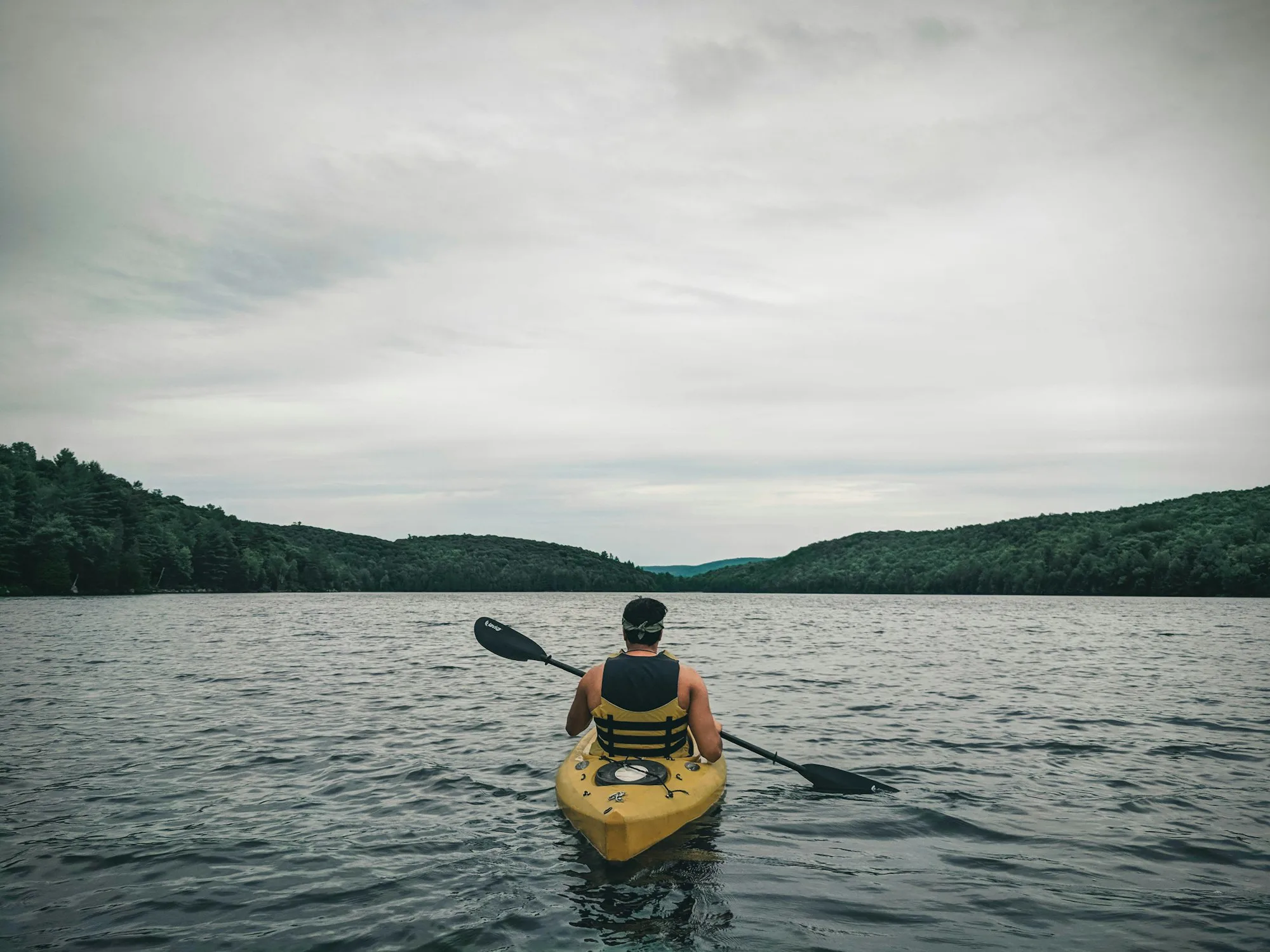 A yellow kayak on the water