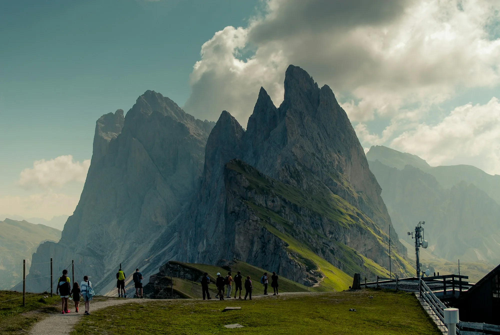 Hikers on the Seceda ridge in the Dolomites