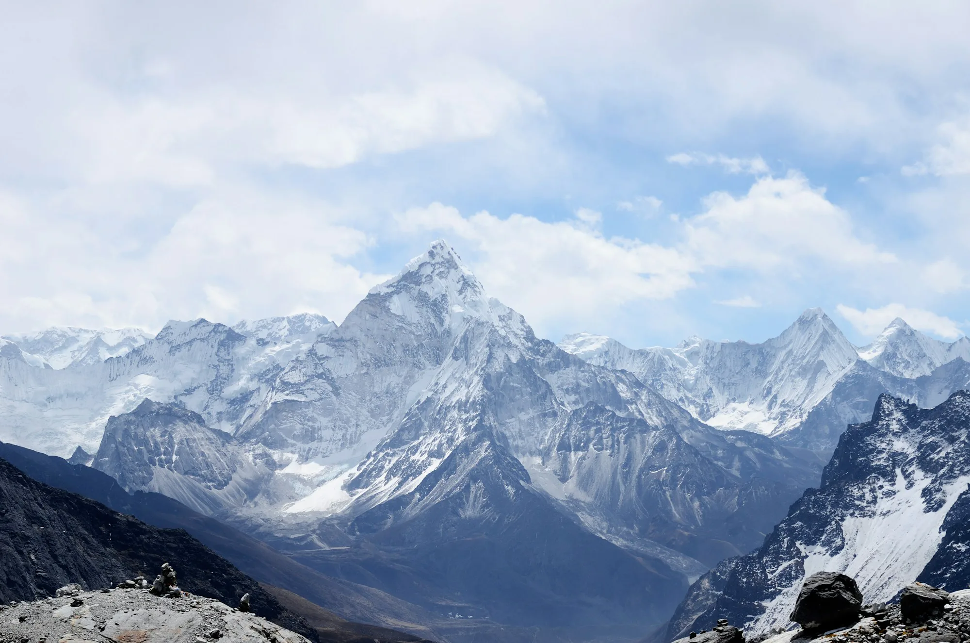 Ama Dablam rising above the Khumbu valley under white clouds