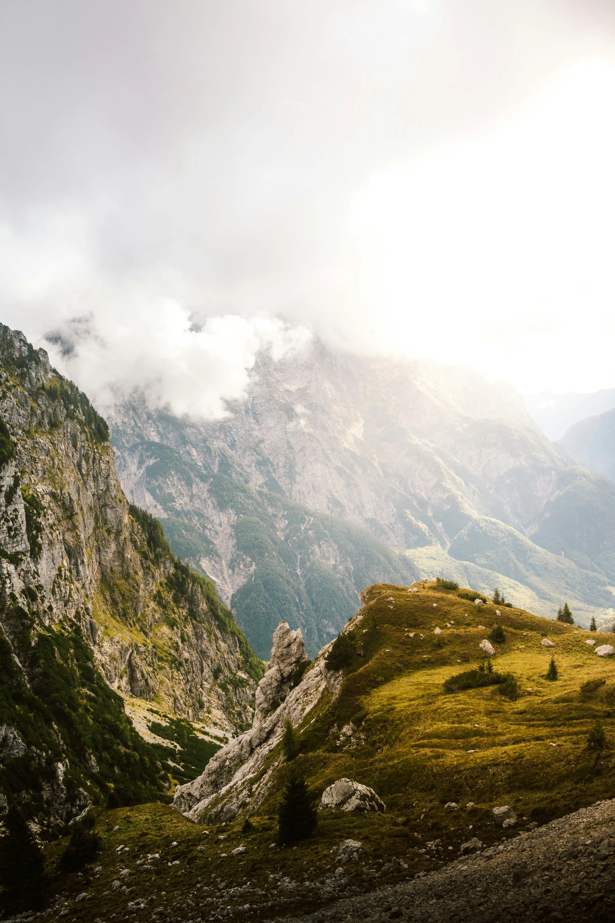 A view down a deep valley between steep mountains